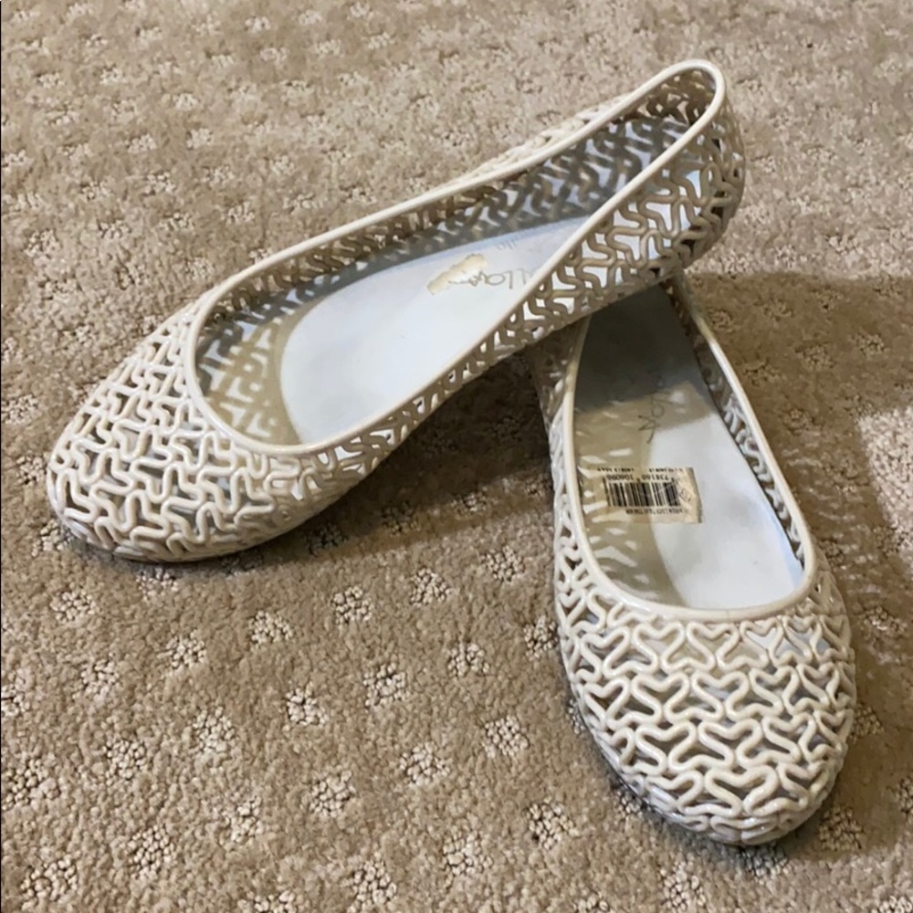 Cream colored jelly slip on flats